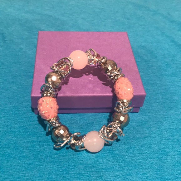 Bracelet, stretch, glass 6in Pink Rondelle - Picture 2 of 6